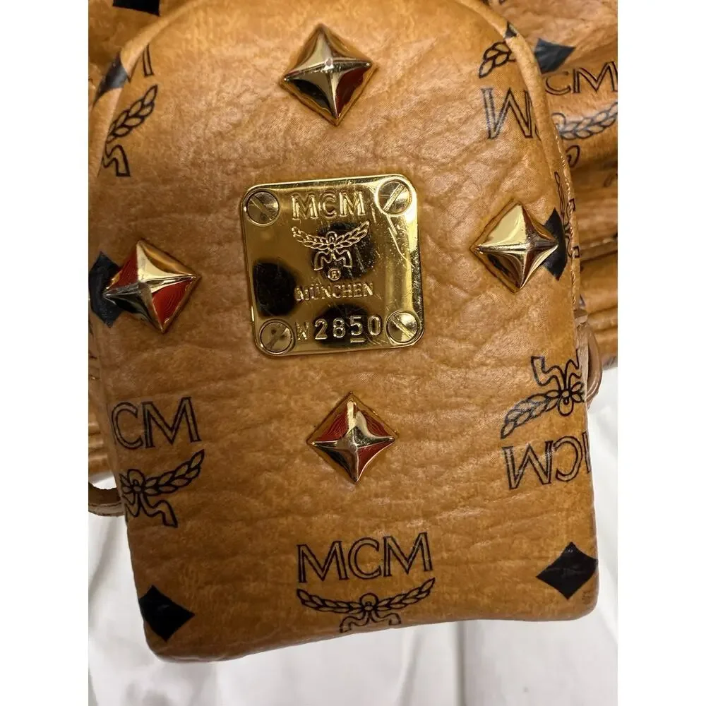 MCM Stark Side Studs Medium Cognac Visetos Backpack Pouch Dust Bag